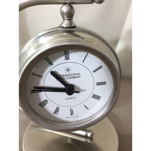 International Silver Desk Clock Rotates Quartz Battery Operated 6" Tall Working - Picture 1 of 4